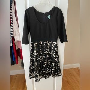 Gently worn and like new black and gold dress